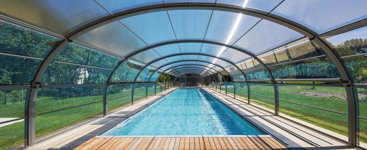Azenco R-Design pool enclosure over a swim lane