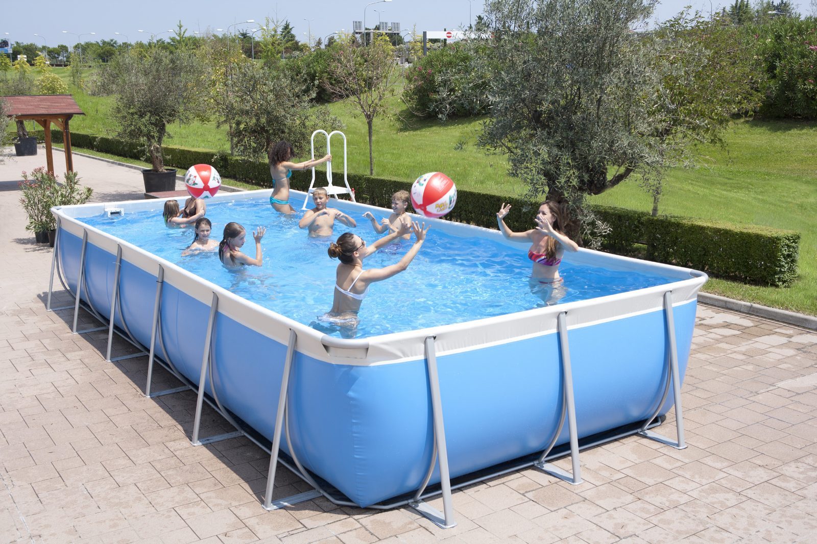 Technypools above-ground pool in a garden